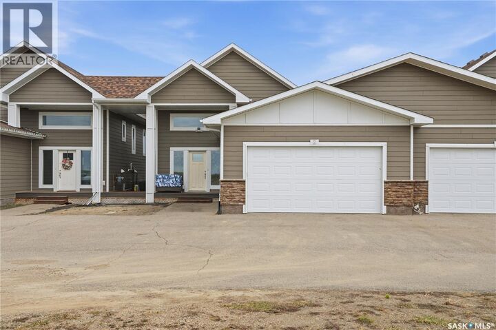 Property Photo:  #2 125 Sunrise Drive  SK S7C 0A6 