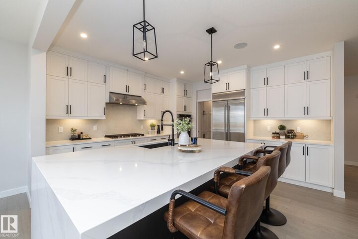 Property Photo:  1448 Darby Green Green SW  AB T6W 4N5 