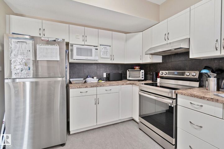 Property Photo:  9512 154 Street NW  AB T5P 2E9 