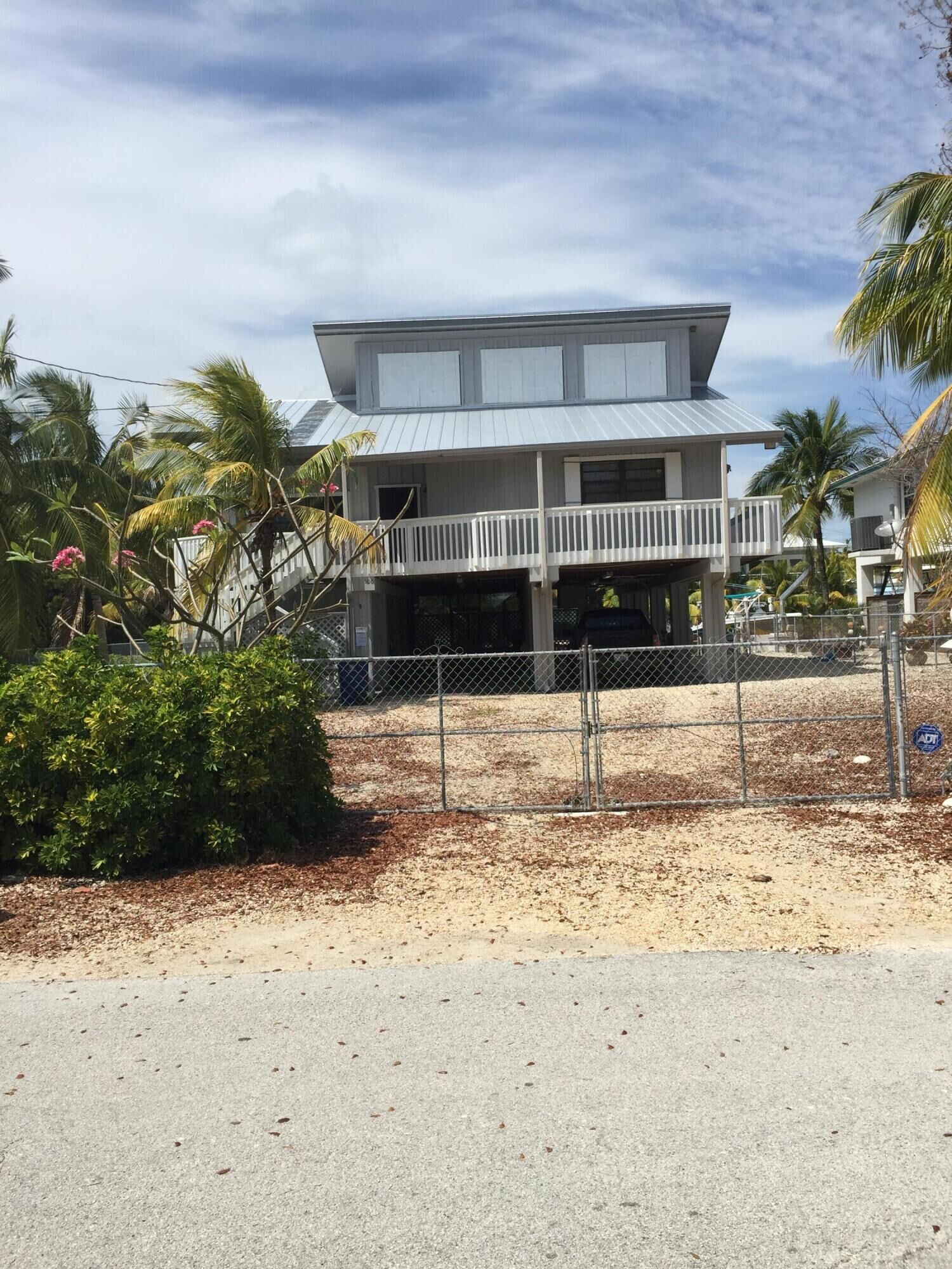 Property Photo:  100 3rd Lane  FL 33037 