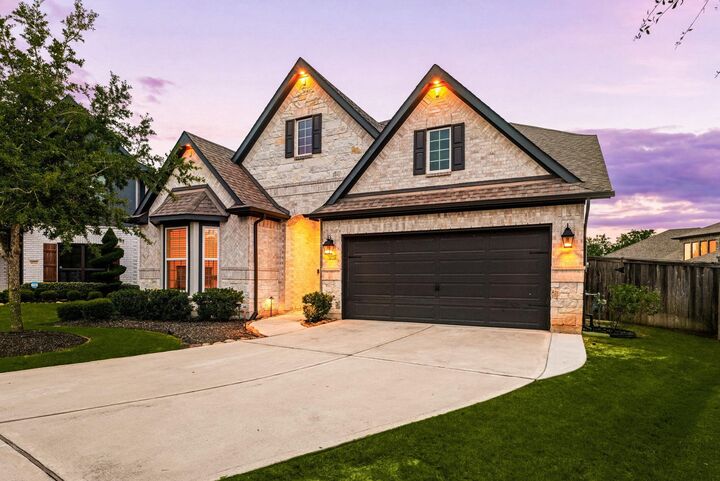 Property Photo: 30718 Parkside Passage Drive TX 77441