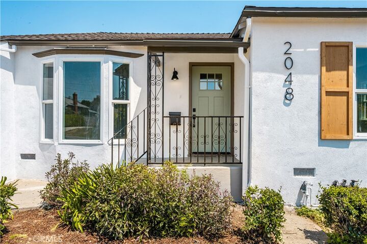 Property Photo:  2048 N Hicks  CA 90032 