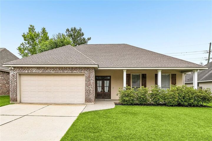 Property Photo:  209 Stonebridge Cove  LA 70447 