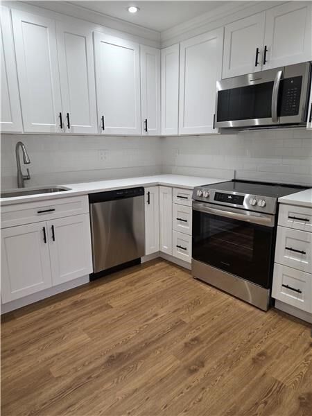 Property Photo:  1000 Lexington 36  MA 02452 