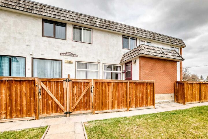 Property Photo:  6147 Buckthorn Road NW 2  AB T2K 2Z2 