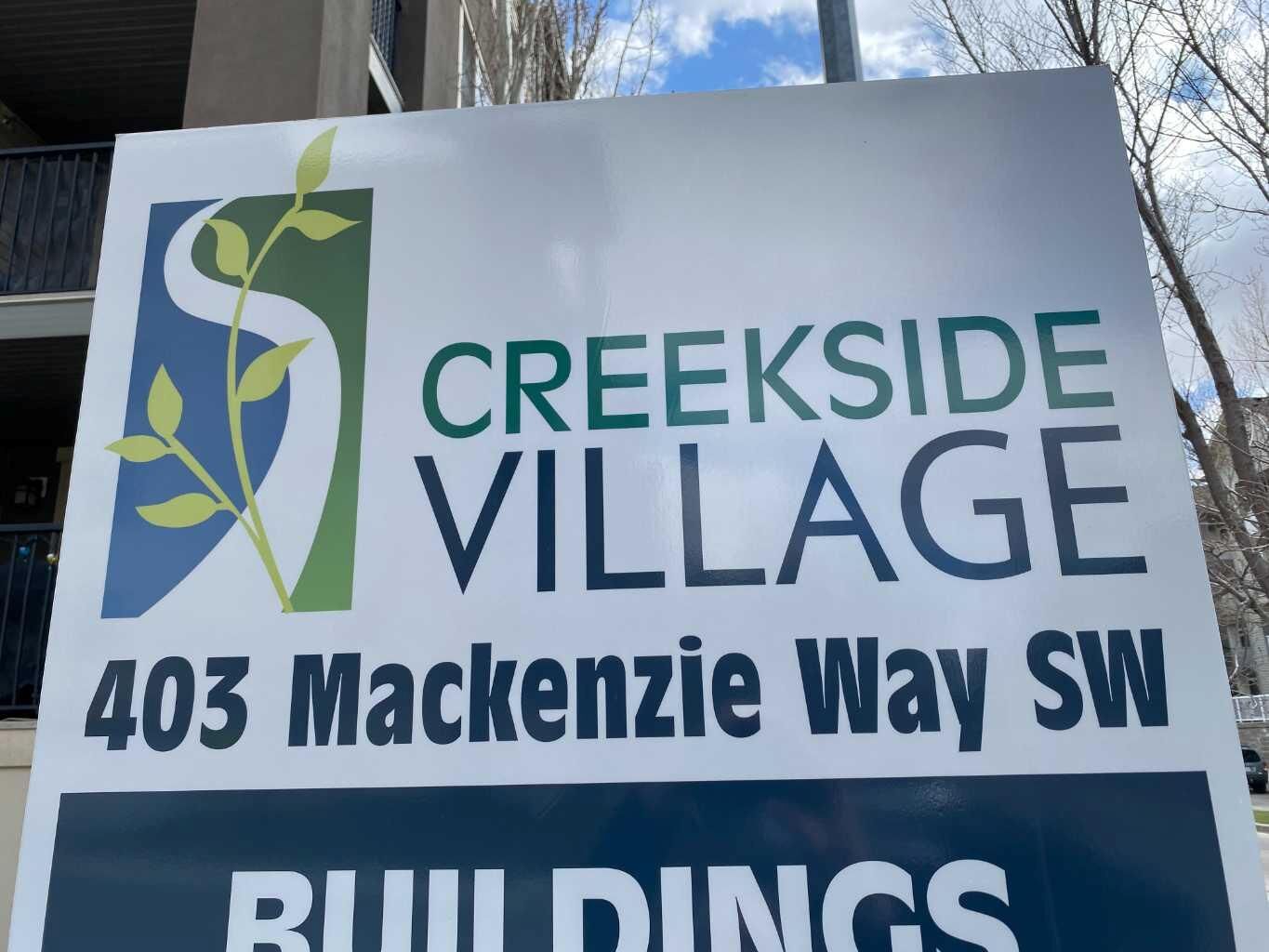 Property Photo:  403 Mackenzie Way SW 8104  AB T4B 3V7 