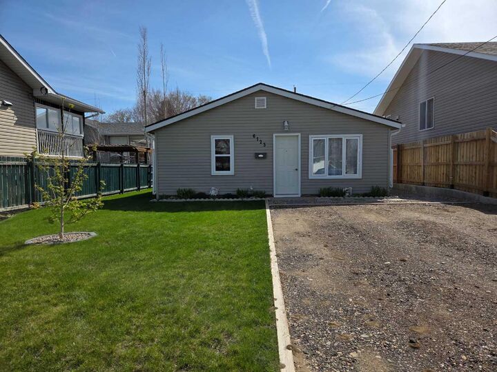 Property Photo:  6123 54 Street  AB T1G 1J9 