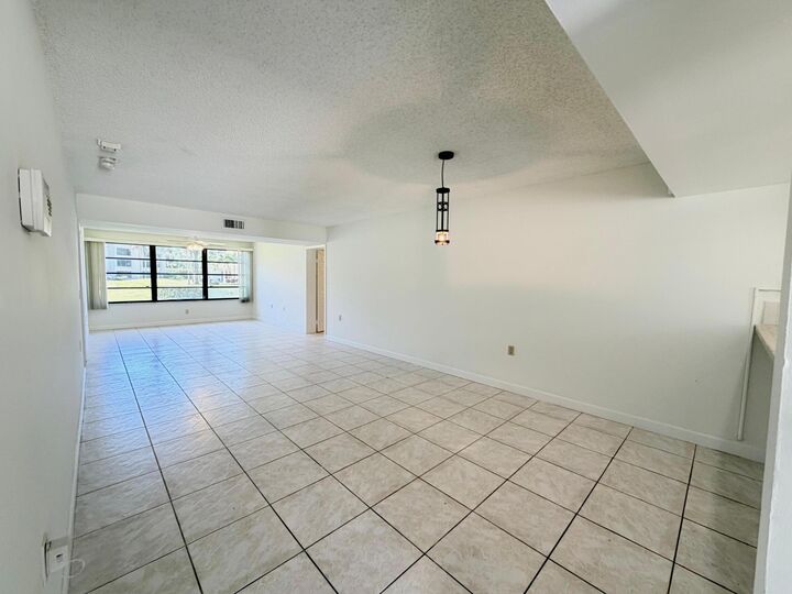 Property Photo:  3511 Village Boulevard Unit 103  FL 33409 
