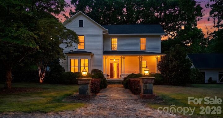 Property Photo:  10915 Beatties Ford Road  NC 28078 