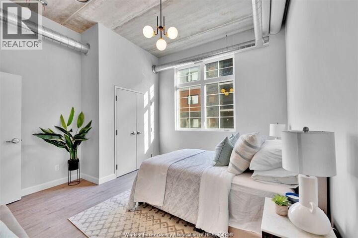 Property Photo:  11941 Tecumseh Road East 401  ON N8N 1L8 
