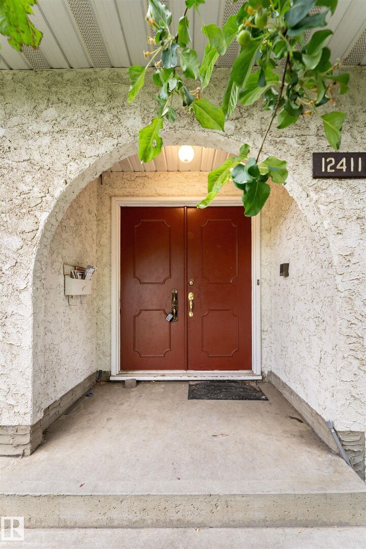 Property Photo:  12411 94 Street NW  AB T5G 1K5 