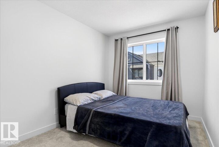 Property Photo:  1910 Collip View View SW 15  AB T6W 5H4 