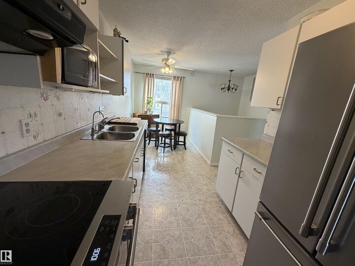 Property Photo:  1875 Mill Woods Road NW  AB T6L 6K2 