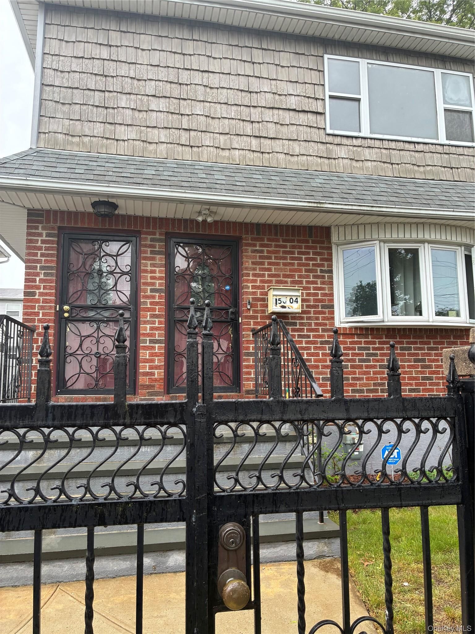 Property Photo: 15004 123rd Avenue NY 11434