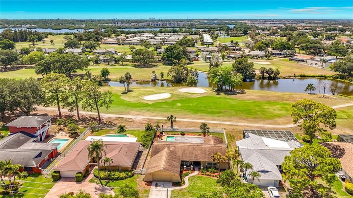 Property Photo:  6490 Burning Tree Drive  FL 33777 