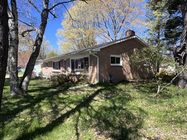 Property Photo:  1056 E Parkdale Avenue  MI 49660 