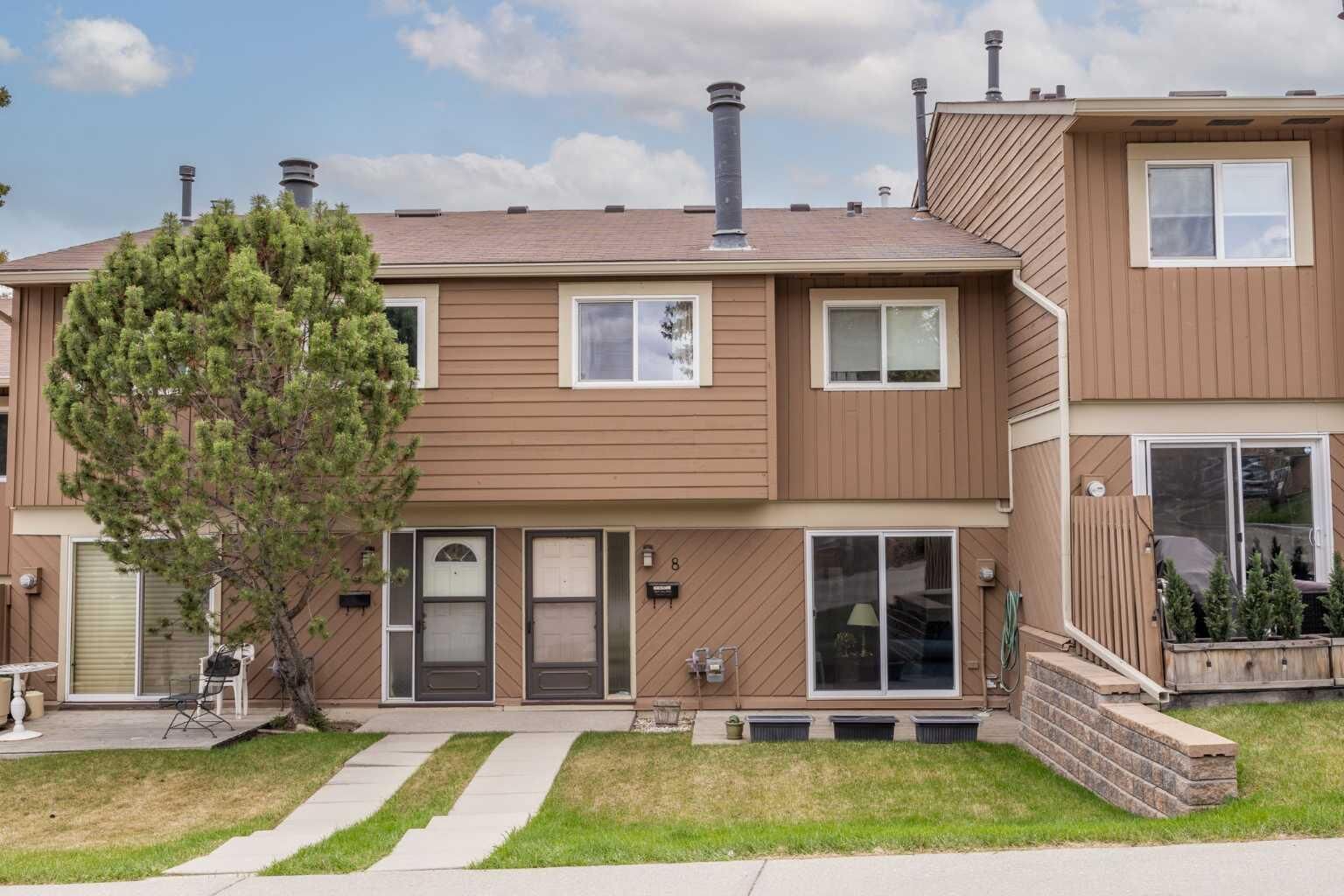 Property Photo:  4940 39 Avenue SW 8  AB T3E 6M7 