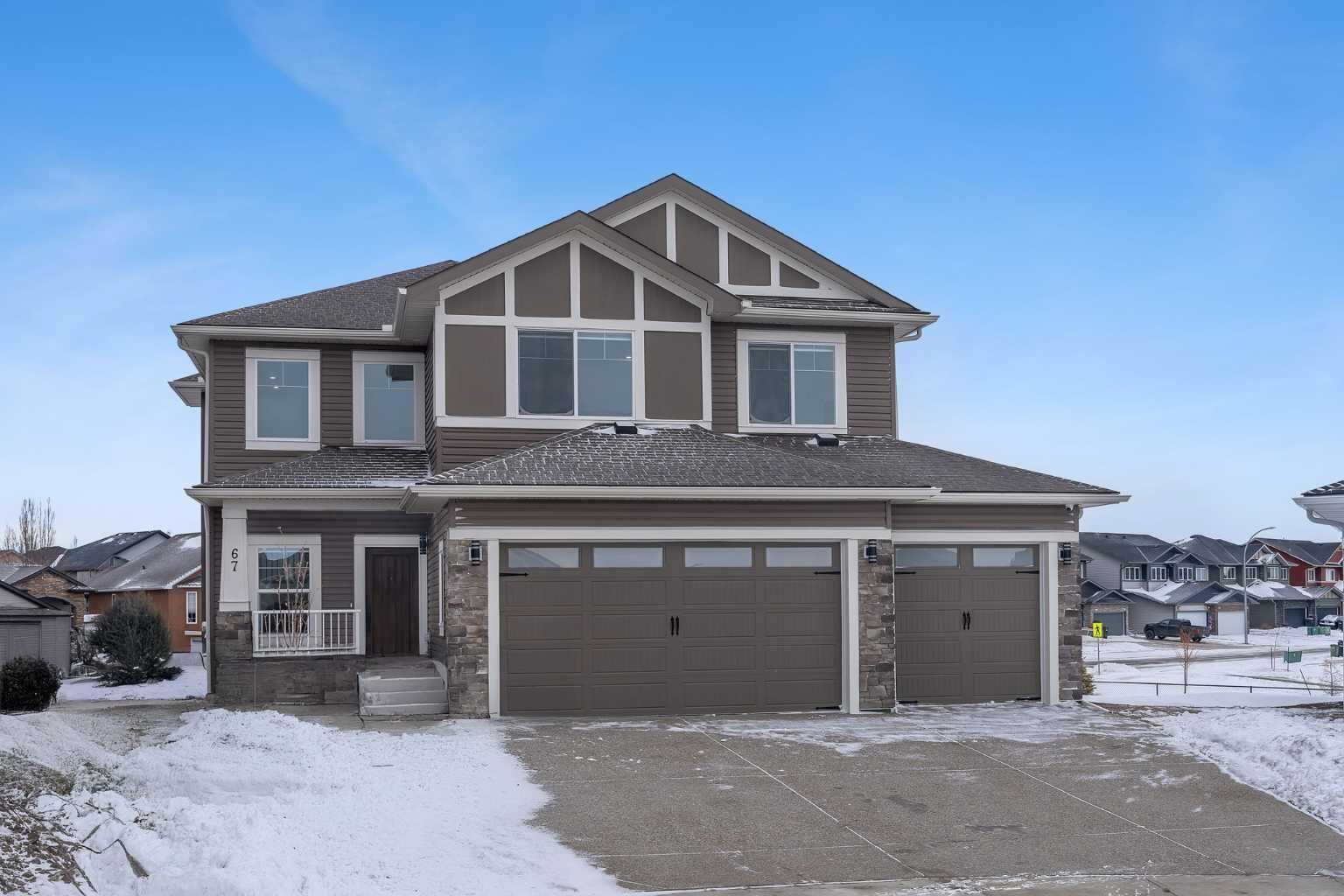Property Photo:  67 Lakes Estates Circle  AB T1P 0B6 