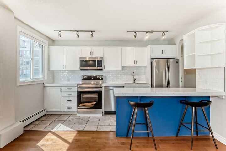 Property Photo:  835 18 Avenue SW 303  AB T2T 0G9 