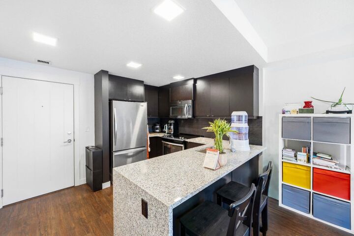 Property Photo:  15 Aspenmont Heights SW 309  AB T3H 0E3 