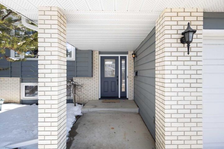 Property Photo:  108                  Woodmont Drive SW  AB T2W 4M3 