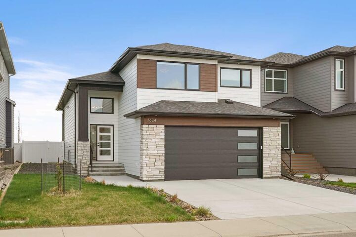Property Photo:  1684 Sixmile View S  AB T1K 8J2 
