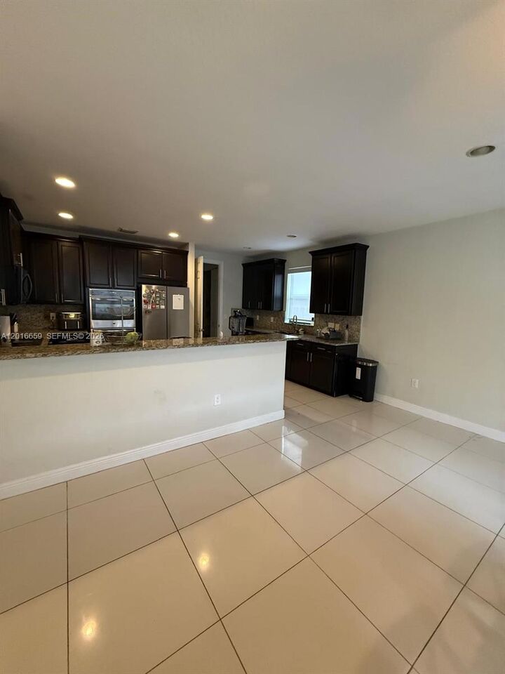 Property Photo:  9845 NW 86th Ter  FL 33178 