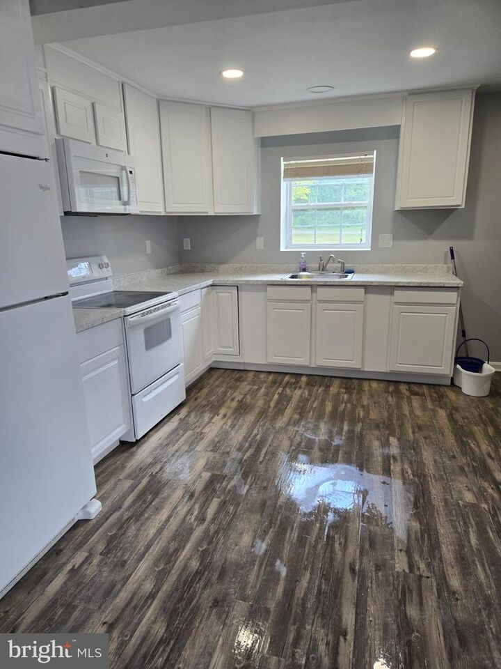 Property Photo: 24170 John Cameron Way 1 MD 20636