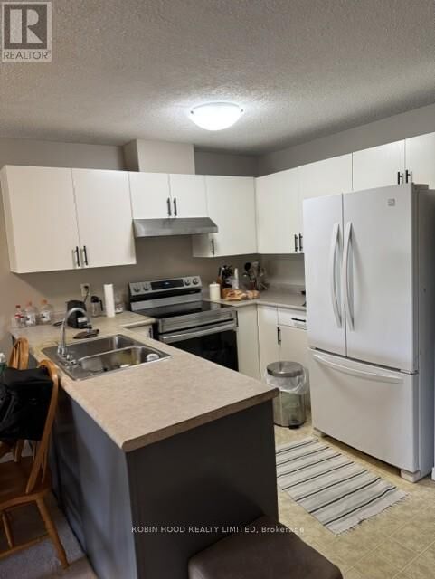 Property Photo:  3160 Wildwood Drive 203  ON N8R 2K8 