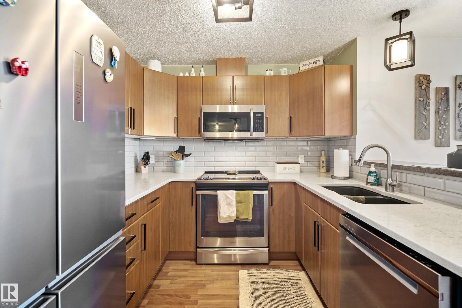 Property Photo:  2436 Guardian Road NW 440  AB T5T 2P5 