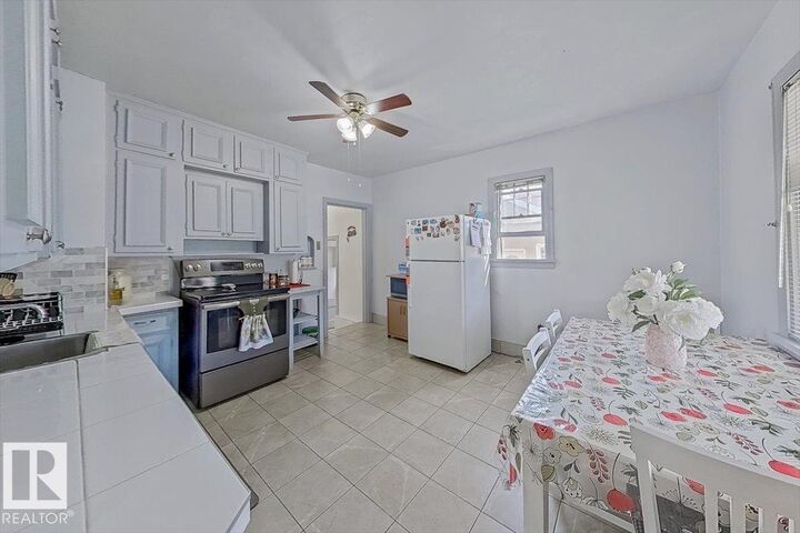 Property Photo:  10939 96 Street NW  AB T5H 2K6 