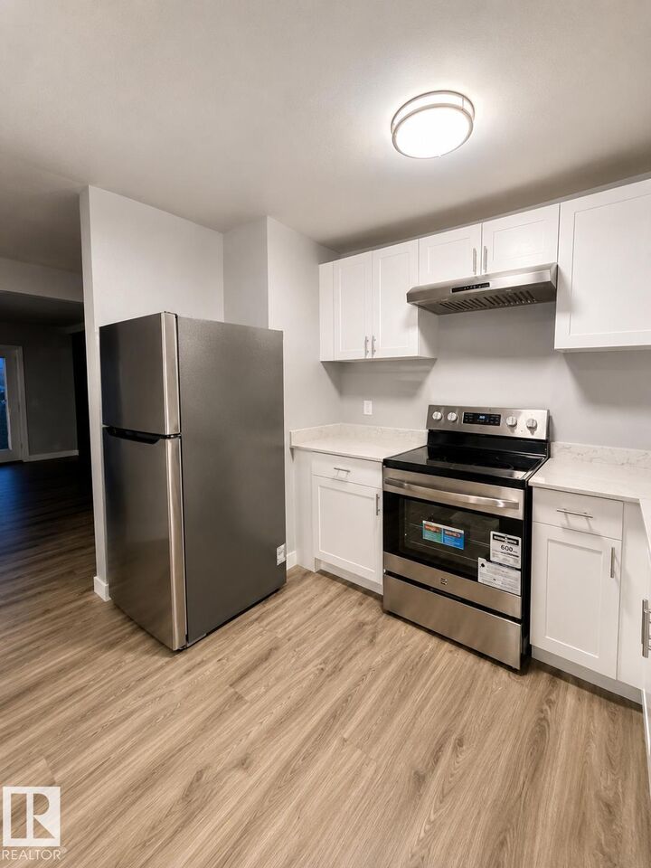Property Photo:  14075 30 Street NW  AB T5Y 1R5 