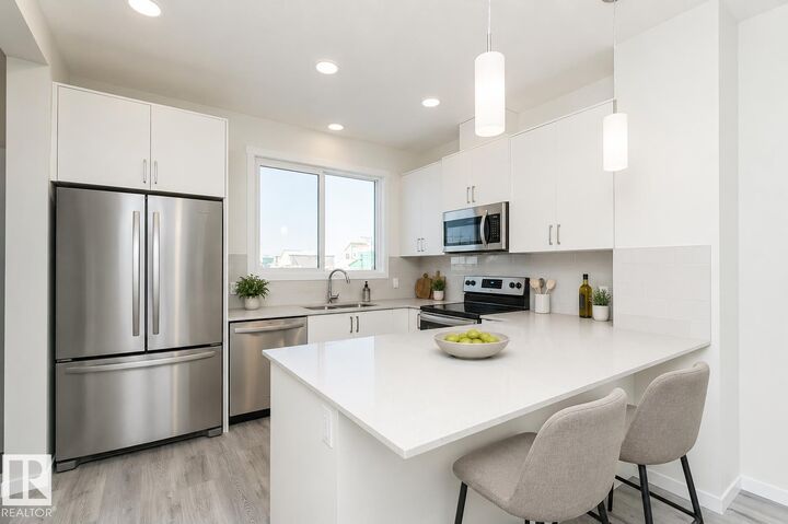 Property Photo: 3896 Wren Crescent NW AB T5S 0S9