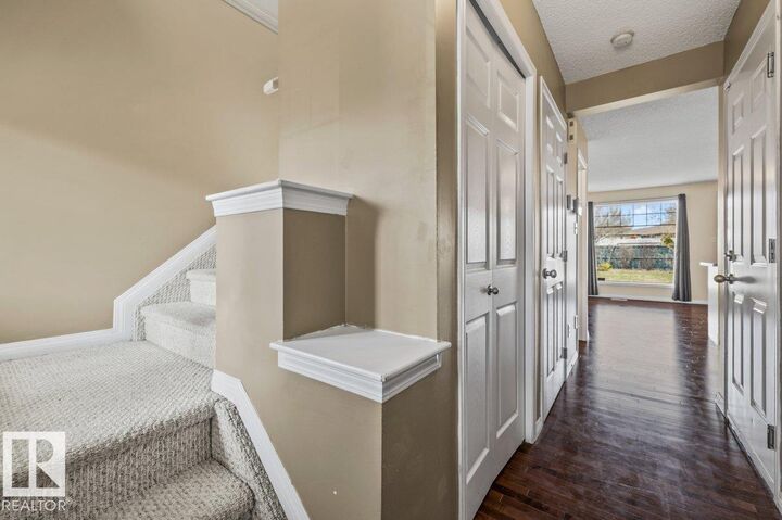 Property Photo:  12148 16 Avenue SW  AB T6W 1L8 