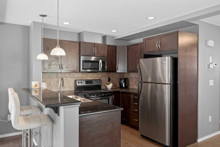 Property Photo: 51 Country Village Villas NE AB T3K 0L7