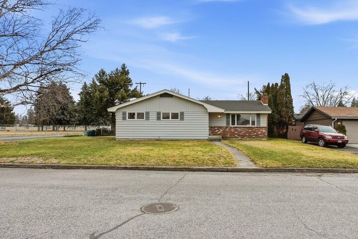 Property Photo:  11822 E 15th Ave  WA 99206 