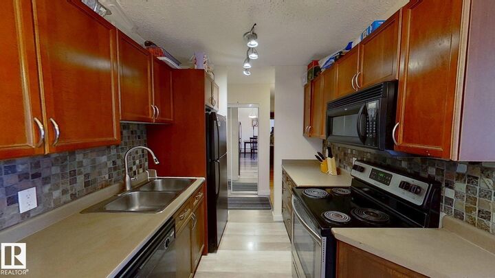 Property Photo:  10326 117 Street NW 401  AB T5K 1X8 