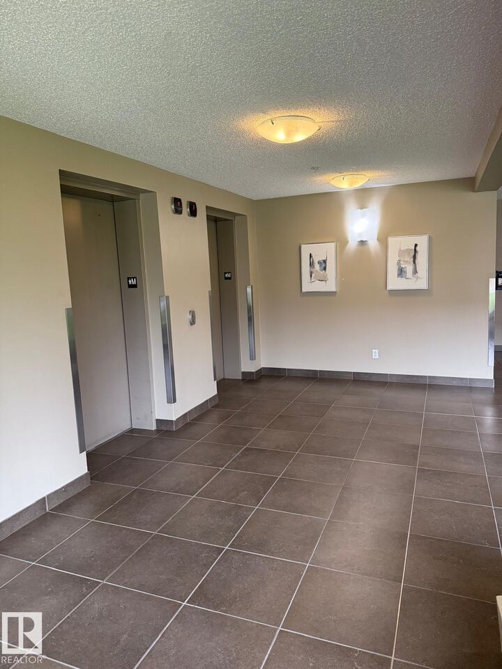 Property Photo:  13908 136 Street NW 412  AB T6V 1X4 