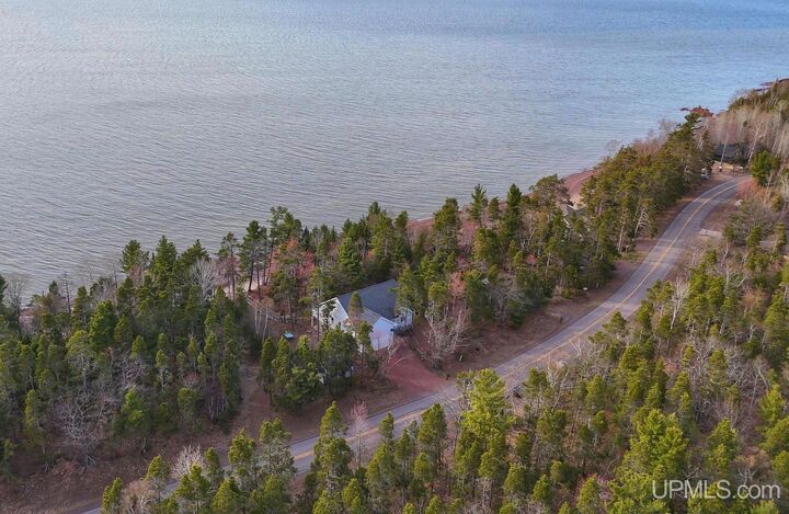 Property Photo: 5877 Five Mile Point Road MI 49805