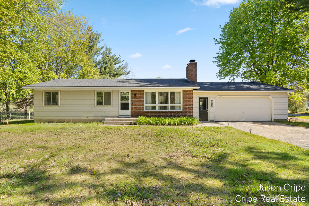 Property Photo:  255 15 Mile Road NW  MI 49345 