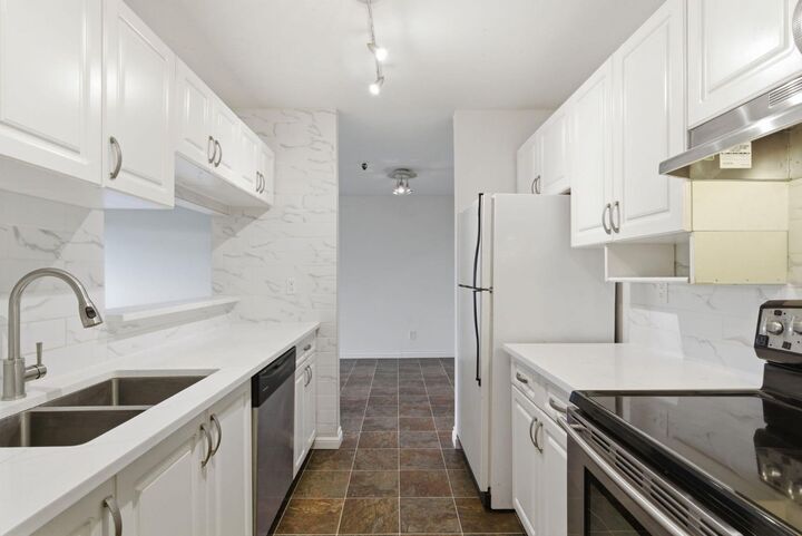 Property Photo:  540 18 Avenue SW 104  AB T2S 0C5 