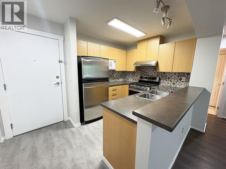 Property Photo:  9339 University Crescent 316  BC V5Y 4Y1 