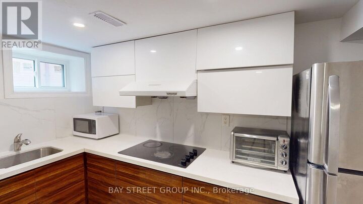Property Photo: 106 Wye Valley Road Bsmt ON M1P 2A8