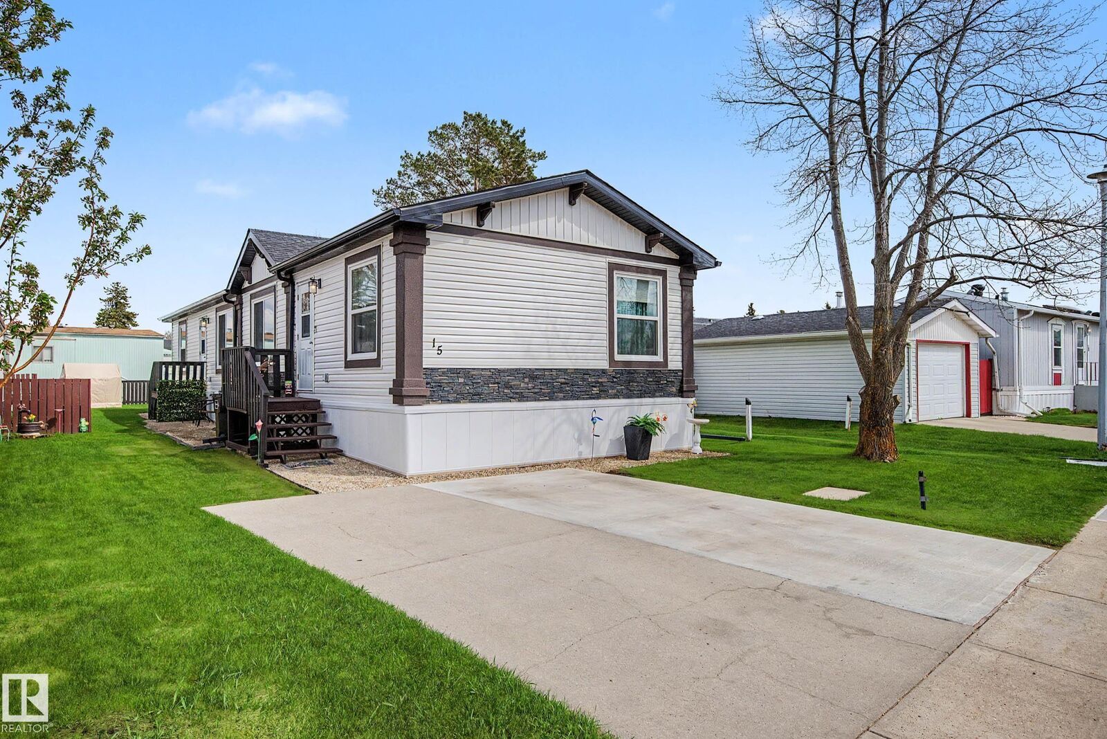 Property Photo:  12604 153 Avenue NW 15  AB T5X 4M7 
