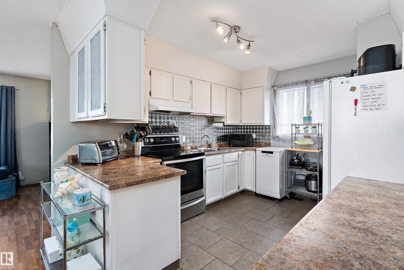 Property Photo: 12916 69 Street NW AB T5C 0H2