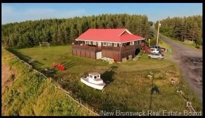 Property Photo: 27 Janeville Beach Road NB E2A 5K3