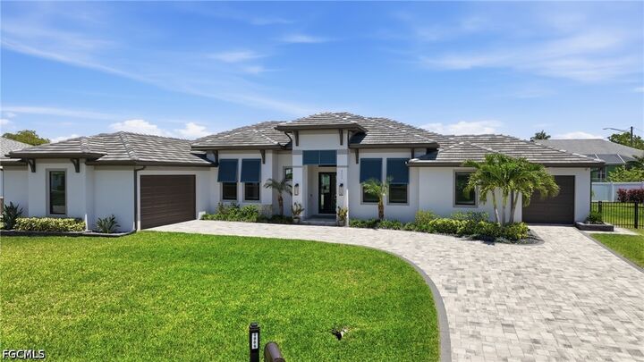 Property Photo:  4009 SW 25th Place  FL 33914 