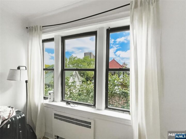 Property Photo:  7427 Boulevard E 32  NJ 07047 