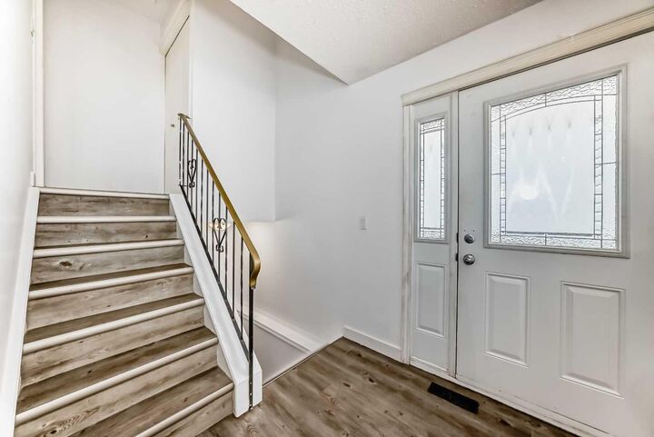 Property Photo:  323 Falwood Way NE  AB T3J 1A9 