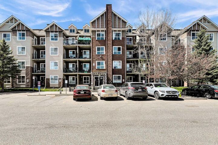 Property Photo: 73 Erin Woods Court SE 1103 AB T2B 3V2
